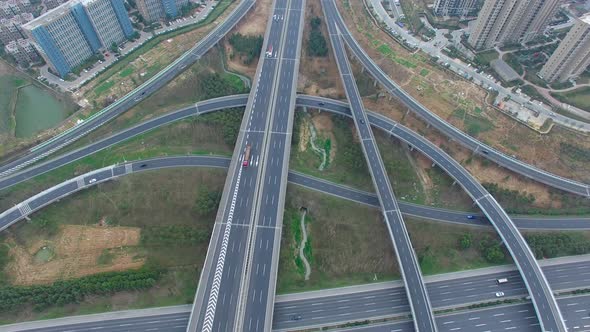 Aerial view of highway and overpass in city