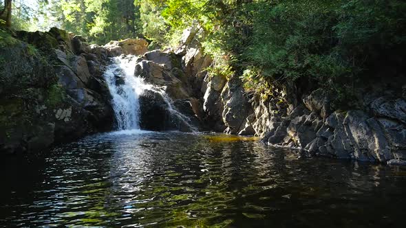 Waterfall Into a Lake