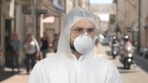 Portrait of a Man in Protective Clothing Standing Downtown