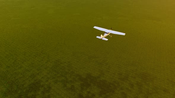 Airplane Landing in Empty Field