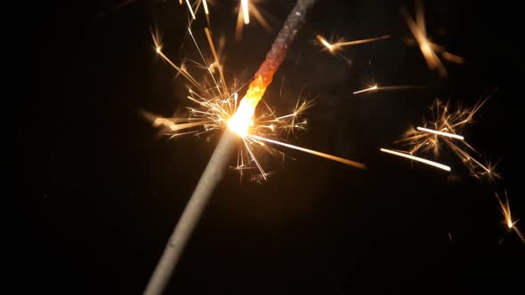 Sparklers Bright Burning Christmas Light on Black Background Closeup