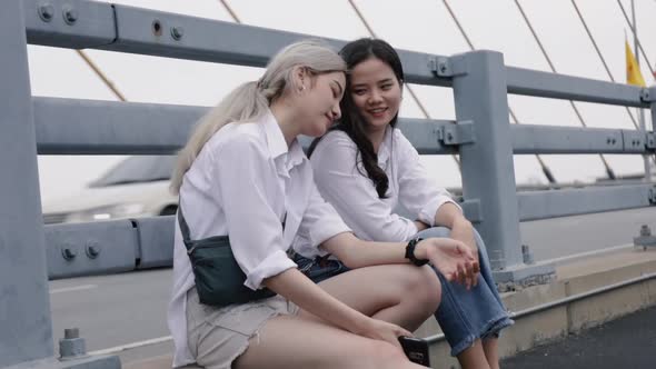 Asian lesbian couples enjoying traveling in Thailand.