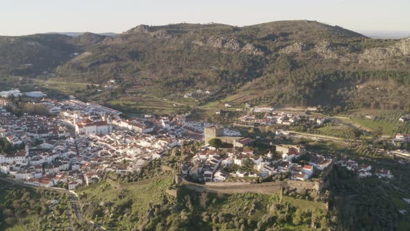 Aerial drone view of Castelo de Vide in Alentejo, Portugal and Serra de Sao Mamede mountains on the