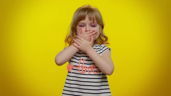 Funny Little Kid Child Girl Closing Her Mouth with Hand Refusing to Tell Terrible Secret Truth