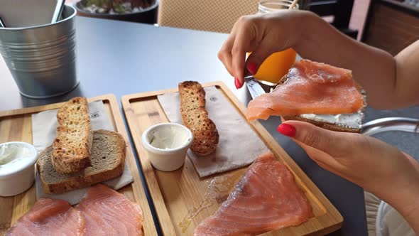 Woman Having Healthy Breakfast in Cafe