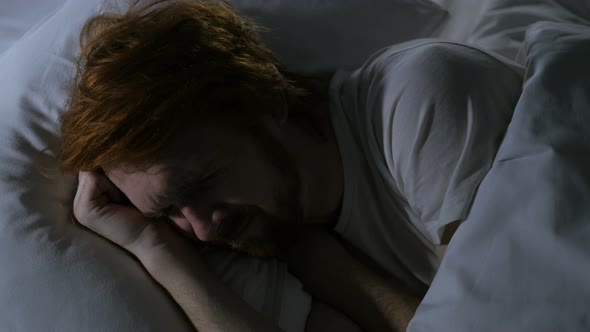 Redhead Beard Man Sleeping in Bed , Relaxing