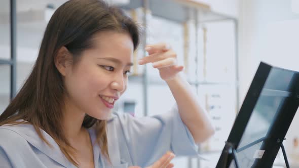 Optical shop concept. Asian girls wearing contact lenses. 4k Resolution.