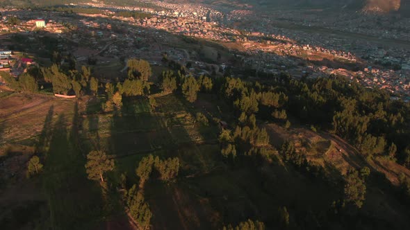 4k aerial drone footage over the lush green hills and mountains in the Northern side of Cusco in Per