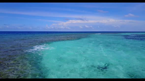 Aerial top down nature of beautiful seashore beach break by aqua blue lagoon and white sandy backgro