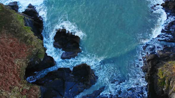 Mountain cliff in sea at dusk 4k