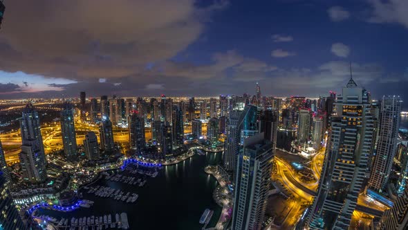 Dubai Marina Skyscrapers and Jumeirah Lake Towers View From the Top Aerial Night to Day Timelapse in