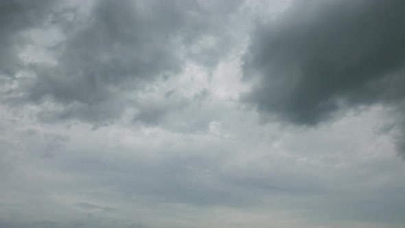 Time lapse of white cloud moving pass around sky background