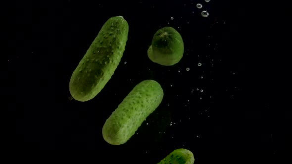 Cucumber Slow Motion Closeup Falling in Water