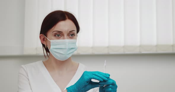 Hospital Female Employee At Laboratory Room Closeup