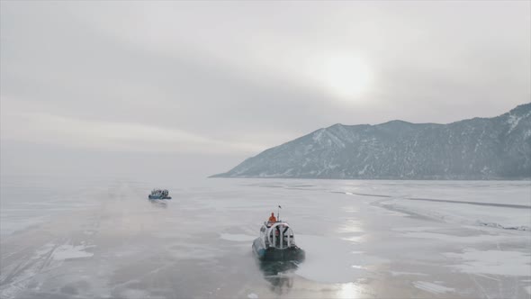 Khivus on a Hovercraft Rides on the Frozen Lake Baikal a Trip to Russia