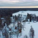 Aerial Top View of the Krimulda Evangelic Lutheran Church in Winter at Sunrise Latvia 4k Video - VideoHive Item for Sale