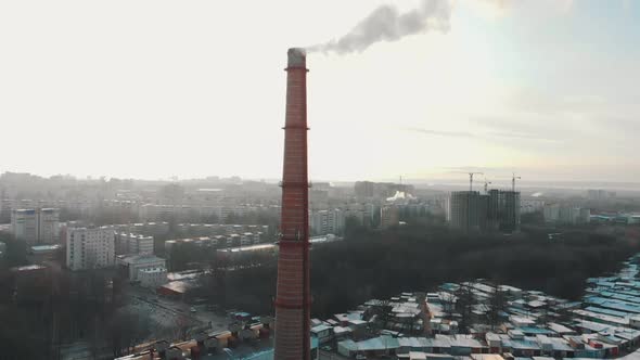 Smoke Coming Out From Pipe From the Industrial Plant Pollutes