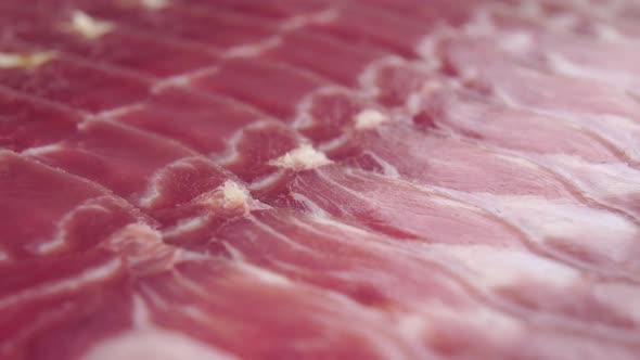 Sliced Iberian jamon in extreme close-up