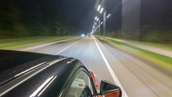 Drivelapse From Top Side of Car Moving on a Night Highway Timelapse Hyperlapse