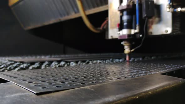 Defocused View of Process of Sheet Metal Laser Cutting