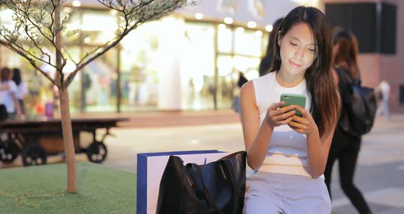 Woman use of smart phone at night 