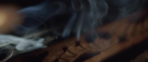 Incense burning in a holder