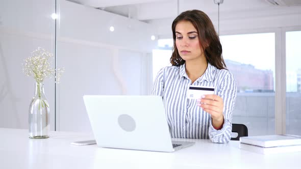 Serious Hispanic Woman Buying Online On Laptop, Payment