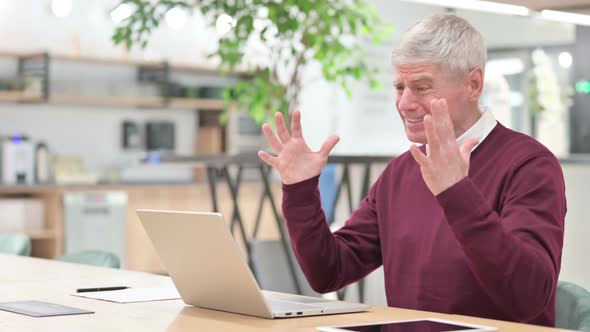 Sad Middle Aged Man Having Failure on Laptop