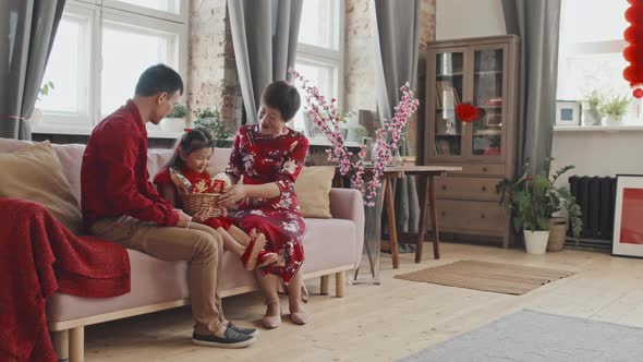 Happy Chinese Family Celebrating Lunar New Year