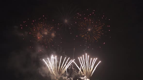 International fireworks festival display at night. Variety of colorful fireworks in holidays