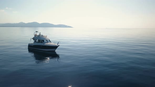 Aerial view of Motor boat on the azure sea of Montenegro