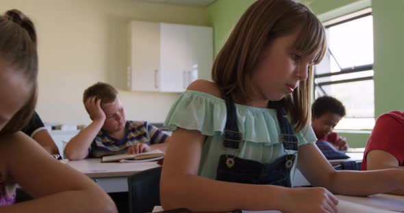 Group of kids studying in the class