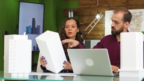 Architect and Construction Engineer Working on a Building Complex