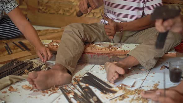 Slowmotion Closeup Shot of a Master Craftsman Doing Traditional Wood Carving