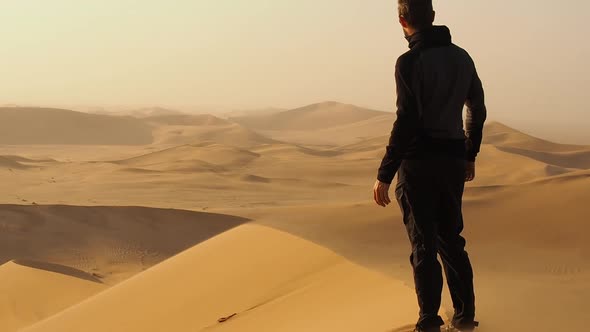 Man in the desert of Namibia, Africa