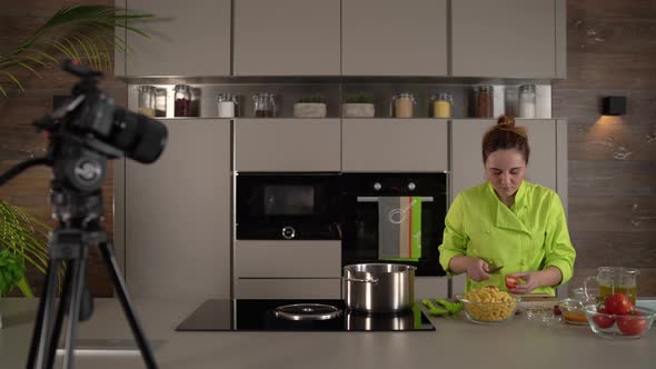 Food Blogger Woman Cooking in Kitchen