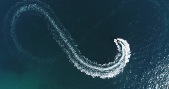 Aerial Top View of a White Pleasure Boat on a Summer Day