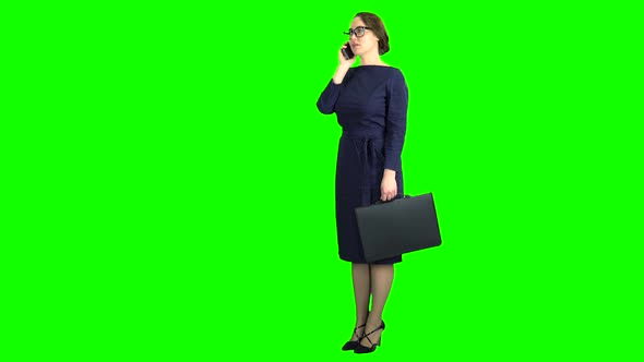 Teacher Stand and Talking on the Phone. Green Screen