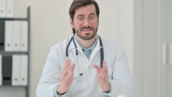 Portrait Young Male Doctor Explaining Medication Video