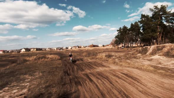 Motorcycles Ride on Gravel Track