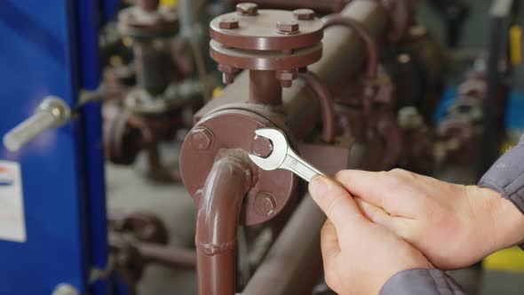 Workers Installing Water Supply Pipeline System Close Up