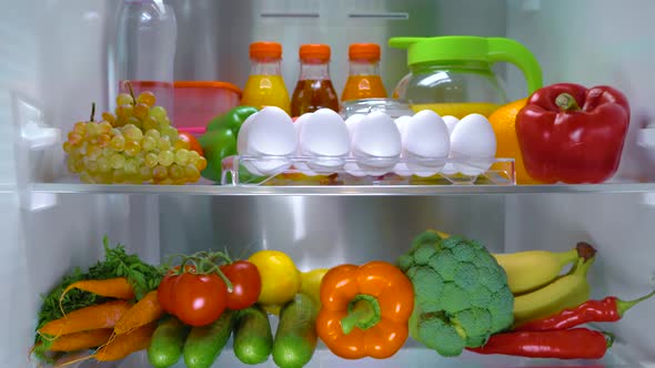 Open Refrigerator Filled with Food