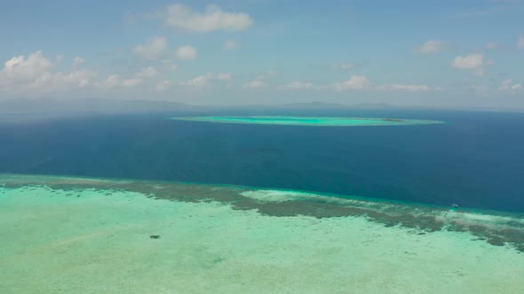 Seascape with Coral Reef and Atoll in the Blue Sea Balabac Palawan Philippines