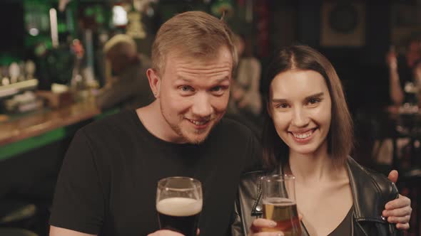 Portrait Of Romantic Couple At Bar