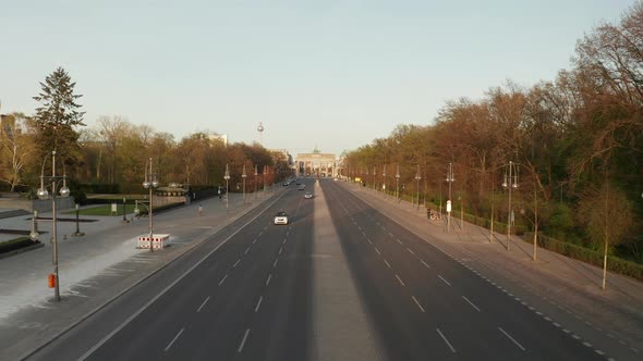 AERIAL: Empty Brandenburger Tor in Berlin, Germany Due To Coronavirus COVID 19 Pandemic in Sunset