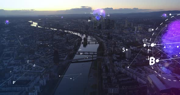 Aerial Panoramic Footage of River Flowing Through Large City at Twilight