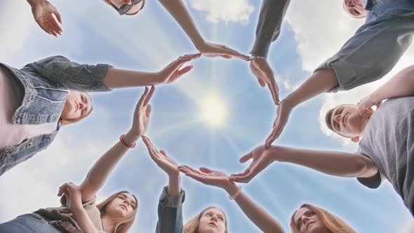 Conceptual Symbol of Cooperation Diverse Hands Making a Circle. Students Help Each Other.