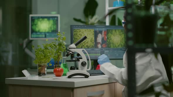 Biologist Woman Examining Biological Slide for Medical Expertise