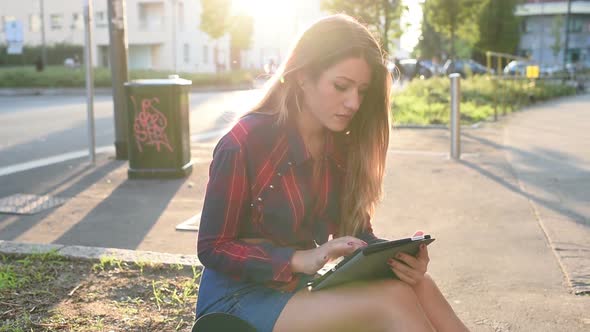 Young woman using tablet