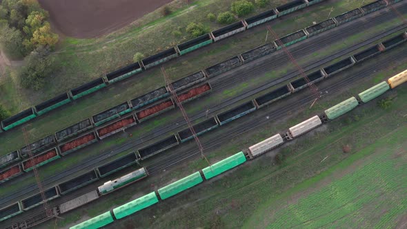 Aerial Drone View of a Diesel Locomotive Pulling Railway Carriages